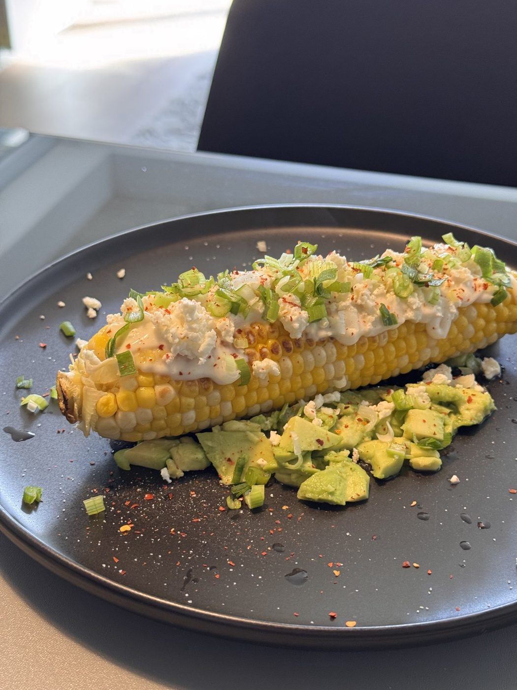 Street corn with avocado and feta